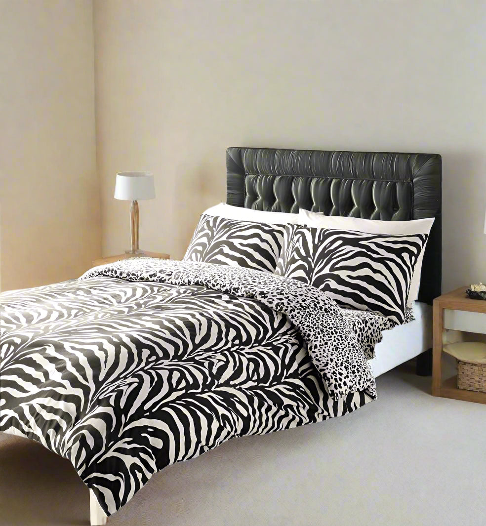 Bedroom with zebra print bedding and decor